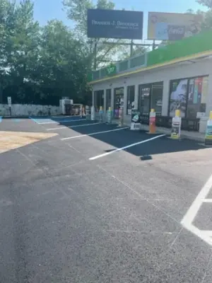 Striped parking spaces beside the BP station building.