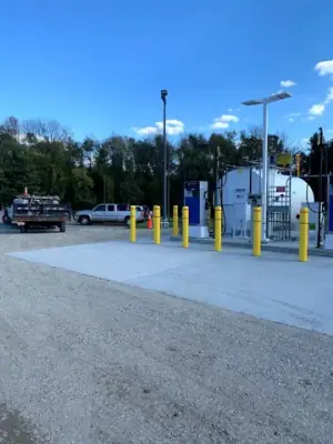 Wide view of the finished fueling area and surrounding access surface.