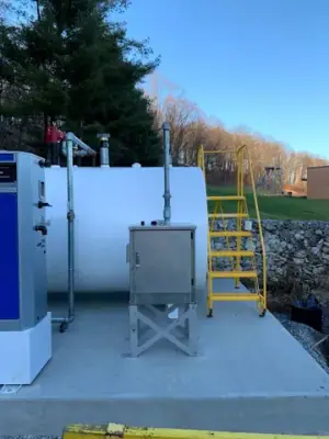 Close views of dispensing equipment and tank-side access hardware.