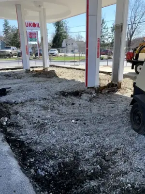 Aggregate preparation around canopy columns and equipment positions.