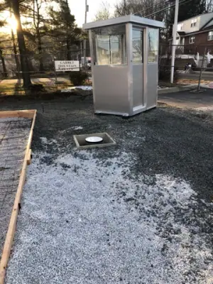 Attendant booth on the aggregate forecourt before surface finishing.