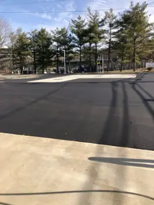 Resurfaced drive area alongside the concrete fueling apron.