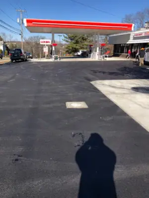 Resurfaced station forecourt facing the canopy and store.