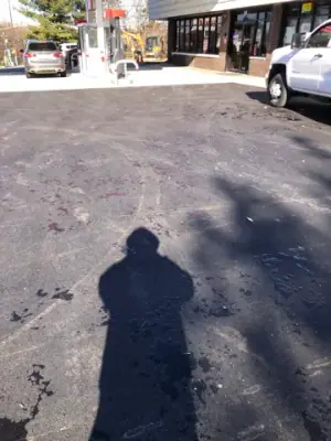 Paved area outside the station building.